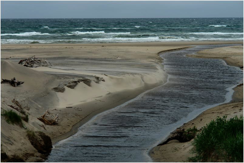 Treibsand verlegt an D&auml;nemarks K&uuml;sten einen Flu&szlig;lauf